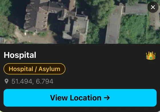 Close-up of a UrbexWorld spot card: an abandoned hospital with aerial photo, category and coordinates